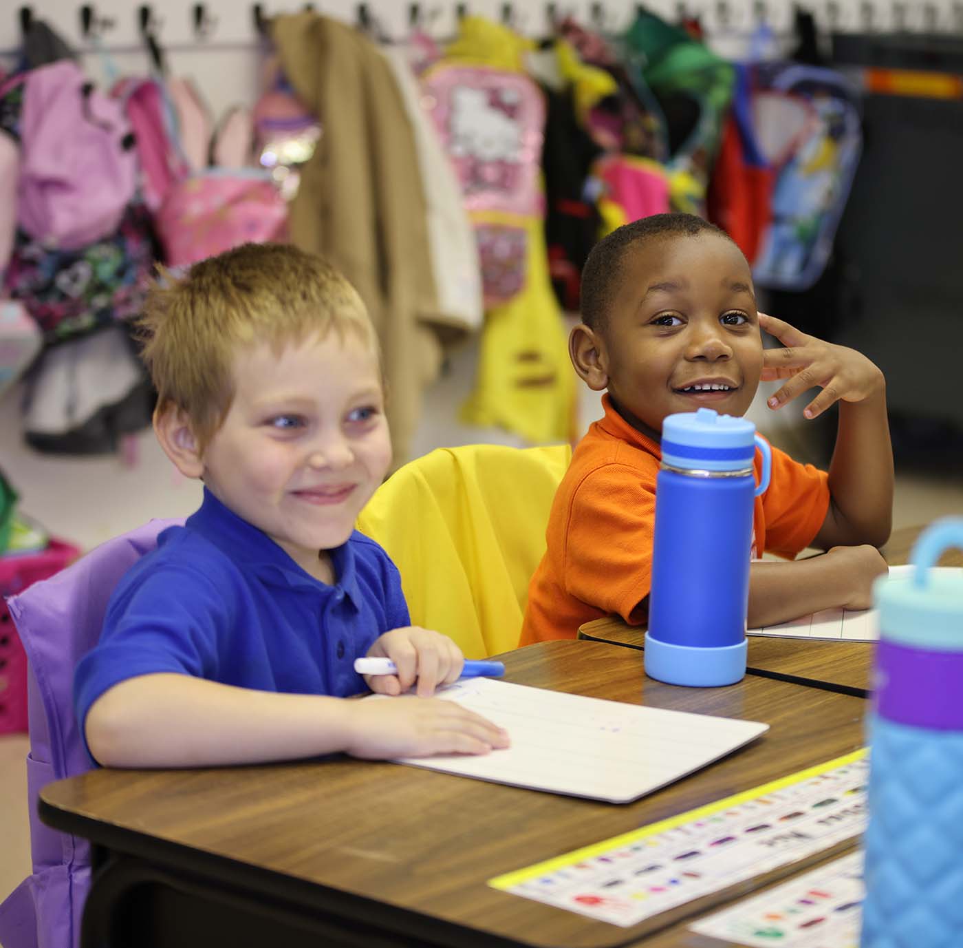 Horizon Science Academy Austintown student drawing at a desk in a classroom setting